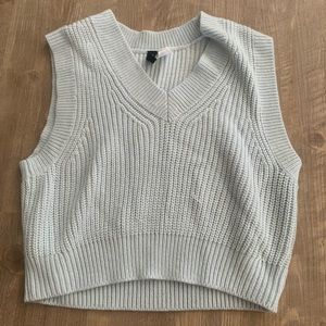 Light blue, knitted vest